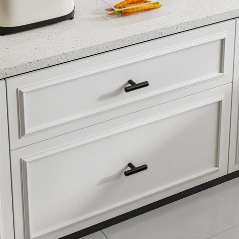 Matte black stainless steel cabinet knobs on white drawers, part of Level Up Your Home Decor With These Badass Matte Black Cabinet Knobs And Drawer Pulls Made From Hella Durable Stainless Steel T Bar Style Handle Design Perfect For Modern Kitchen And Bathroom Renovation Projects 10 Piece Set Included.