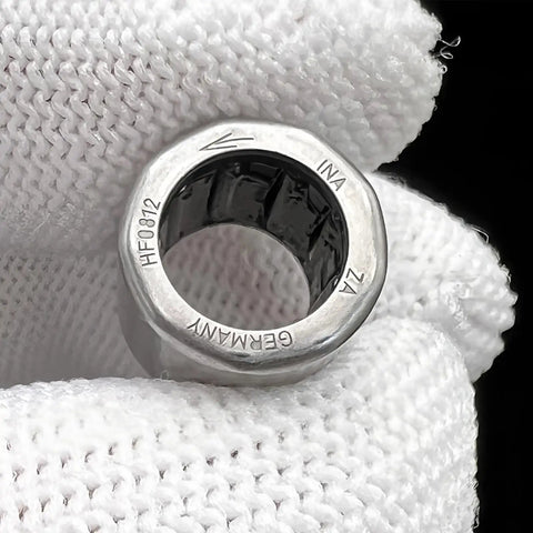 Heavy Duty One Way Needle Roller Clutch Bearing Drawn Cup Design 8X12X12 Mm shown in hand, highlighting quality and details.