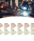 Magnetic V Type Welding Clamp Set In Stainless Steel 6 Piece Fixture Kit in front of welder with sparks in background