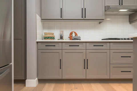 Kitchen with matte black cabinet hardware showcasing 40 Pack Solid 5 Inch Center to Center Slim Square Bar Drawer Handles Matte Black Cabinet Hardware for Kitchen Cabinets Easy Install Pulls and Handles Dope Modern Kitchens.