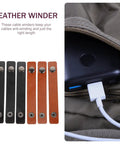 Slick Six Piece Leather Cord Organizer Set With Secure Press Button Closure Premium Cable Sleeves for neat desktop tidy.