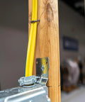 SimPull Solid Indoor 14/2 NM-B Cable With Ground For Easy Pull Installation In Dry Indoor Circuits, mounted on a wooden stud