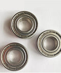 Top Shelf 440 Stainless Steel Deep Groove Ball Bearing S6215ZZ With Double Metal ZZ Shields 75X130X25MM, showing three units arranged.