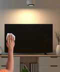 Person using Giant 7 By 8 Inch Screen Wipes Pre Moistened For Safe Cleaning Of TV Computer Laptop Phone And Tablet Screens 40 Count