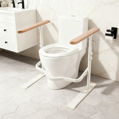 Heavy Duty Toilet Safety Rails For Seniors With Nighttime Reflective Armrests And Base No Fuss Height Adjustments Bulletproof Bathroom Support Bar Fits Standard Toilets Wood Trim next to a toilet in a bathroom setting.