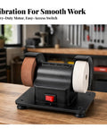 No Nonsense Benchtop Grinding Machine With Twin Wheel Sharpening And Polishing Pure Copper Motor Stable Rubber Base A Rock Solid Shop Dog For Daily Garage And Workshop Use on wooden workbench with a heavy-duty motor.