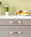 Elegant cabinet handles featuring a red rose oil painting design, durable white crystal glass knobs for kitchen cupboards.