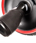 Close up of Killer Ab Rocker And Complete Core Toning Setup steel handles and non-slip grip for effective workouts.
