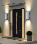 Slick 13 Inch White Square Outdoor Wall Sconce With Uplight And Downlight Tough Aluminum Frame Matte Texture Warm Glow mounted by a modern door.