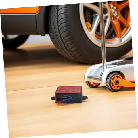 No Sweat Auto Rescue 30G Fire Extinguisher With Super Sticky Back Adhesive For Sedans Trucks And Trailers Self Activating Heat Killer And Essential Firefighting Gear For Weekend Drives And Road Trips near a car wheel.
