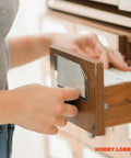 Score That Rustic Look Instantly With This Set Of Two Red Rooster Metal Knobs Made As Top Tier Dresser Pulls And Cabinet Hardware For A Quick Home Makeover You Gonna Totally Love, showing a hand opening a wooden drawer.