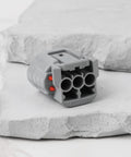 Heavy Duty 3 Pin Alternator Adapter Connector For Denso Toyota Lexus Kubota 16678-65830 90980-11349 on gray surface.