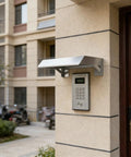Heavy Duty EV Charger Cover With Sloped Stainless Steel Roof, weatherproof canopy over a wall-mounted control panel.