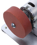 Close-up of Knockout Bench Top Electric Grinding Machine with Rock Solid Anti Slip Base, featuring grinding wheel for metal polishing.