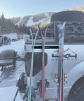 Badass Magnetic Ski And Snowboard Vehicle Rack Keeping Your Ride Spotless With Soft Waterproof Padding For Reliable All Season Winter Storage And Trail Ready Adventures with skis mounted on truck.