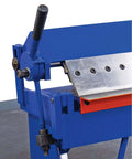 Close-up of 48 Inch Pan and Box Sheet Metal Brake with adjustable removable fingers for precise 135° bends in workshop use.