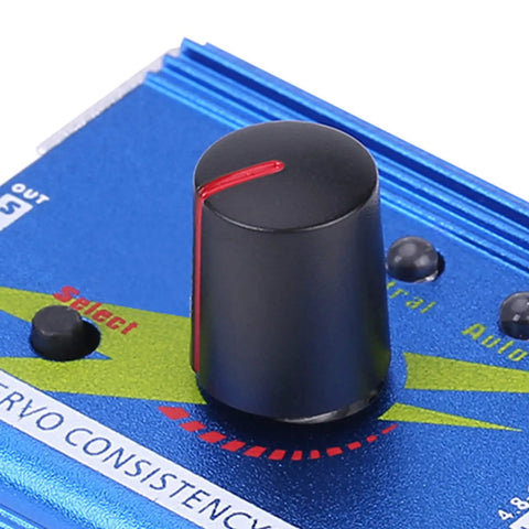 Close-up of Dope Servo Tester And Controller For RC Gear, showing blue control panel with black knob for multi servo diagnostics.