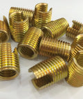 Solid 50 Piece Thread Repair Kit With M3 Slots Made From Tough Carbon Steel Self Tapping Tool That Fixes Stripped Screws And Restores Threads Like A Boss For Heavy Duty Jobs. M3 thread inserts, carbon steel, close-up