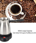 Electric Turkish Coffee Maker 600Ml Capacity With Even Heating For Coffee Tea And Milk, 600W Dual Protection Electric Kettle With Anti Scald Handle, Portable For Home And Travel displayed next to coffee beans and cup
