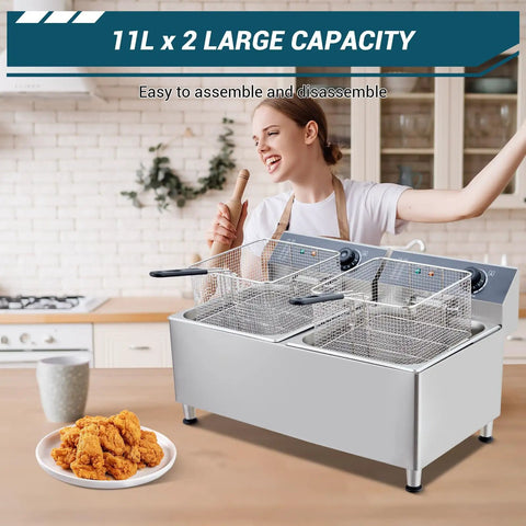 Festisoul 22Qt Double Commercial Electric Deep Fryer, 3400W Powerful Heating System With Stainless Steel Construction, XL Baskets And Lids Featuring Built In Oil Filtration For Restaurant, Catering And Food Truck Use in a kitchen setting with fried chicken.