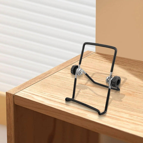Two Pack Foldable Solar Panel Stands With Adjustable Tilt Mounts, durable black metal support on wooden surface