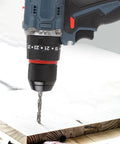 Heavy Duty Cordless Drill Driver With 1500 Rpm Max Spin And 25 Torque Settings High Low Gear Reversible Operation No Sweat Performance Rock Solid Go Getter For Garage Fixes And Weekend Builds drilling into wood.