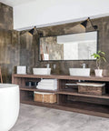 Modern bathroom with Vintage Industrial Wall Sconce Light Set of Two With Adjustable Swing Arm in Bronze Finish over mirror.