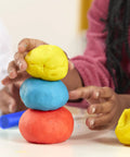 Massive Bulk Modeling Compound With Twelve Four Ounce Cans Packing A Knockout Array Of Jewel Tones Absolutely Perfect For Kid Safe Arts Projects And Creative Crafting Vibes, stacking colorful clay balls.