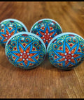 Flat Out Gorgeous Hand Painted Ceramic Drawer Knobs And Snazzy Floral Cabinet Pulls With Vibrant Blue Red Green Designs For Kitchen Bathroom Furniture Upgrades Set Of Six - Colorful floral design knobs on wooden surface.