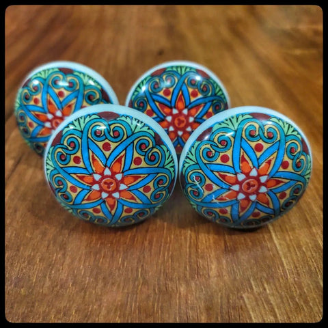 Flat Out Gorgeous Hand Painted Ceramic Drawer Knobs And Snazzy Floral Cabinet Pulls With Vibrant Blue Red Green Designs For Kitchen Bathroom Furniture Upgrades Set Of Six - Colorful floral design knobs on wooden surface.