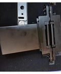 Heavy Hitter Hidden Hydraulic Hinge For Wooden Doors, features robust black design, two-dimensional adjustment, smooth mechanism.
