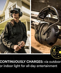 WorkTunes Connect Solar Wireless Hearing Protector With Bluetooth, 26 dB NRR, solar charging, shown in use and on table