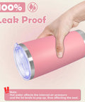 20 Ounce Stainless Steel Tumbler With Secure Lid Pink Insulated Coffee Cup being held, showcasing leak-proof design and pink color.