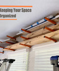 Beefy Heavy Duty Lumber Storage Wall Rack Set With 3 Level Wood Organizer Mount in garage, holding lumber above windows