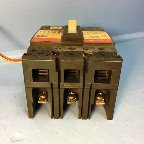 Hardened 3 Phase 3 Pole 60 Amp Circuit Breaker With Electronic Trip And Free Standing Mount Built For 600 Volt 50 60 Hz Systems viewed from the front.