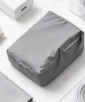 Heavy Duty EV Charger Cover With Snag Proof Drawstring Closure Waterproof Dustproof Weather Guard Built Tough As Nails For Outdoor Plug Protection Goes Hard Rain Or Shine in gray fabric.