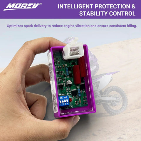 Close-up of 5 Pin AC CDI Ignition Module Replacement for ATV Dirt Bike Scooter Go Kart with DIP switch visible in hand
