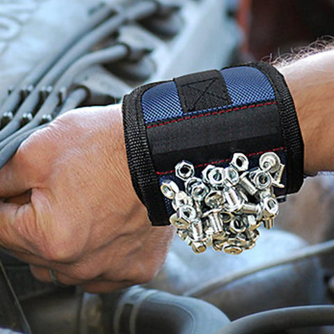Three Row Magnetic Wrist Tool Holder With Ultra Strong Grip For Screws Nails And Fasteners Hands Free Magnetic Wristband For DIY Pros Mechanics And Makers Deep Blue Finish, close-up on wrist