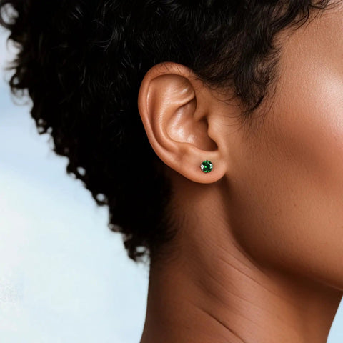 Snag Dope G23 Implant Grade Titanium Screw Back Earrings Hypoallergenic Nickel Free Jewelry For Sensitive Skin lightweight 5mm green zirconia studs worn on ear.