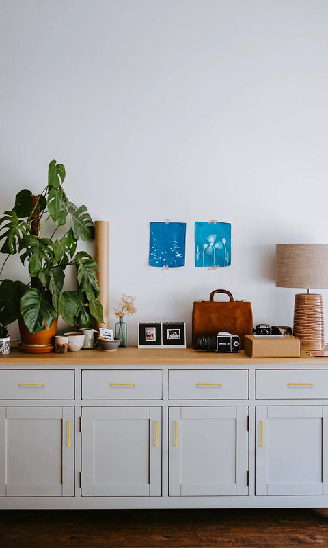 Brushed Brass Cabinet Pulls Hella Sturdy Drawer Handles For Kitchen Cabinets And Dressers Five Inch Center Spacing displayed on sleek furniture.