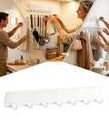 Premium Heavy Duty Self Adhesive Coat Rack Wall Mount Featuring Seven Robust Hooks for organizing kitchen tools and towels.