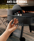 Hand holding Magnetic Storage Bin For Grills And Pellet Smokers, Heavy Duty Magnetic Organizer on grill hopper showing anti-slip hooks.