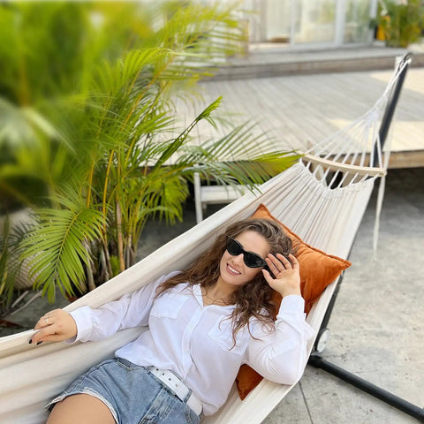 Garden Cotton Hammock With Spreader Bar For Patio And Backyard Ultra Comfortable And Strong Up To 450 Lbs, woman relaxing outdoors