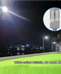 Heavy Hitter Solar Street Lights With Wireless Remote Control Insane Bright 9000W Led Floodlight illuminating a wide area at night.