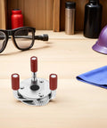 No Fuss High Grade Stainless Steel Smoke Sensor Remover Gripper Tool on a wooden table with safety gear.
