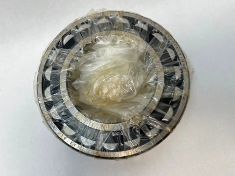 22216 Spherical Roller Bearing With 80mm Inner Diameter and 140mm Outer Diameter Measuring 33mm Wide for Heavy Duty Applications.