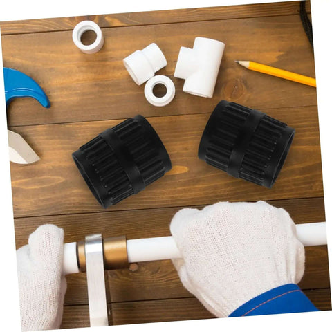 Two Piece Inner Outer Reamer Deburring Tool Set for Water Pipes on a wooden table with copper piping, gloves, and fittings