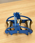 Industrial Grade Cable Pulley Roller Guide Assembly For Heavy Duty Routing On Assembly Lines Built Tough As Nails With Carbon Steel Construction Three Wheel Wellhead Tool Featuring 160 And 60 Mm Specs. Blue three-wheel carbon steel cable pulley guide on wood surface