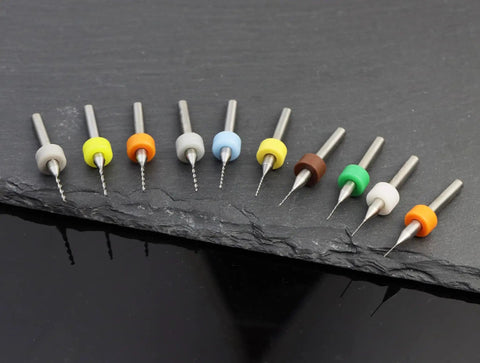 Pro Grade Carbide PCB Drill Bits Set, 30 Pcs Spiral Flute Micro Bits arranged on black surface