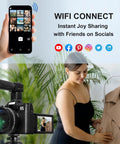 6K 64MP Digital Camera With Flip Screen And Dual Lens For Photography And Vlogging, woman using WiFi feature for social sharing.